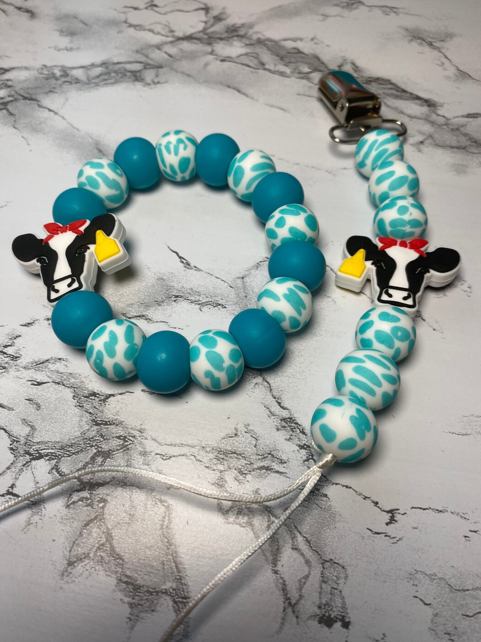 Aqua Daisy Cow Teething Set