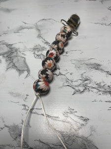 Dark Daisy Pacifier Clip