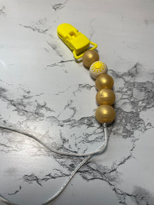 Gold Sun Pacifier Clip